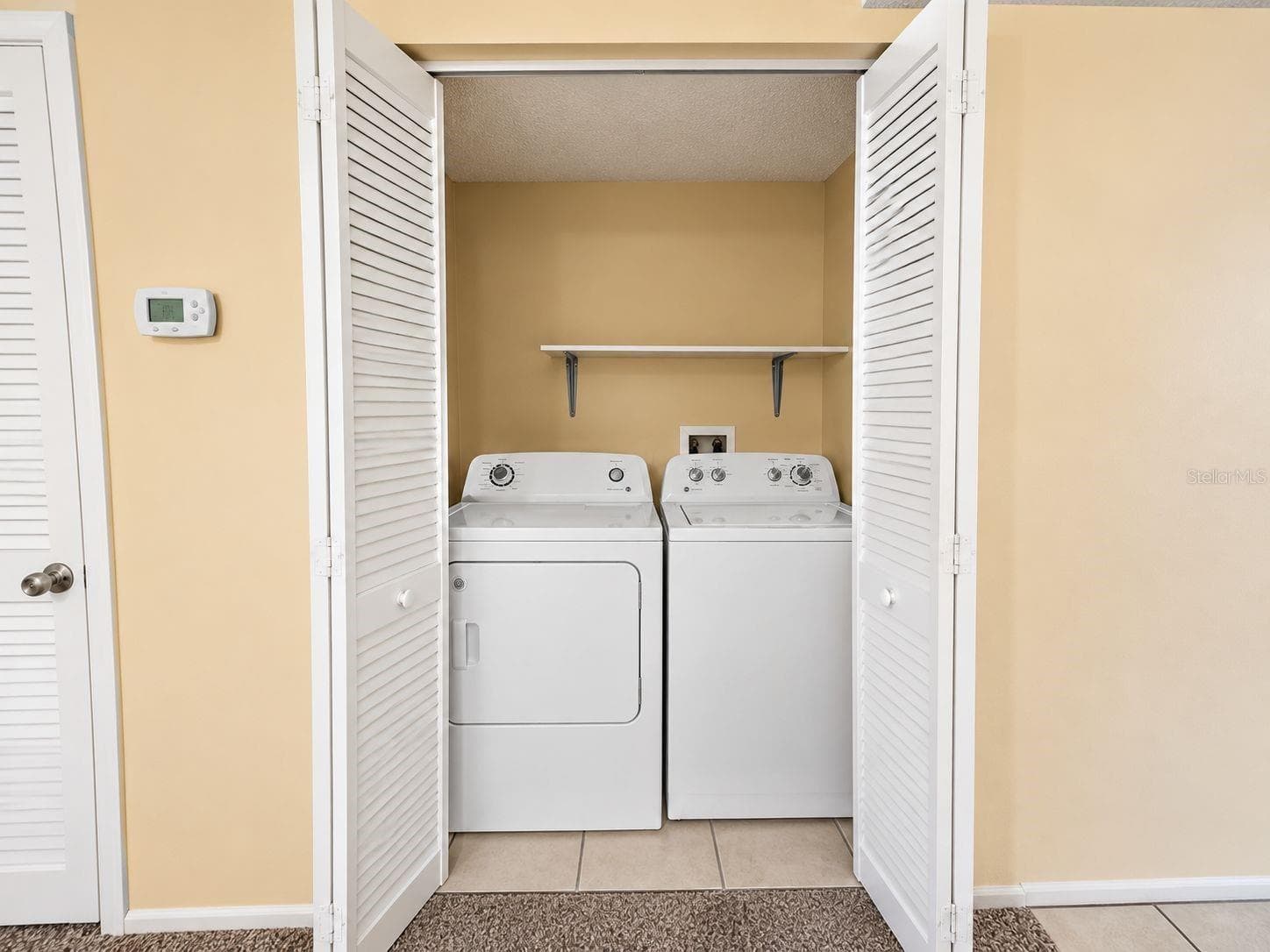 Laundry Closet with full size washer & dryer - 2625 STATE ROAD 590 #1724, CLEARWATER