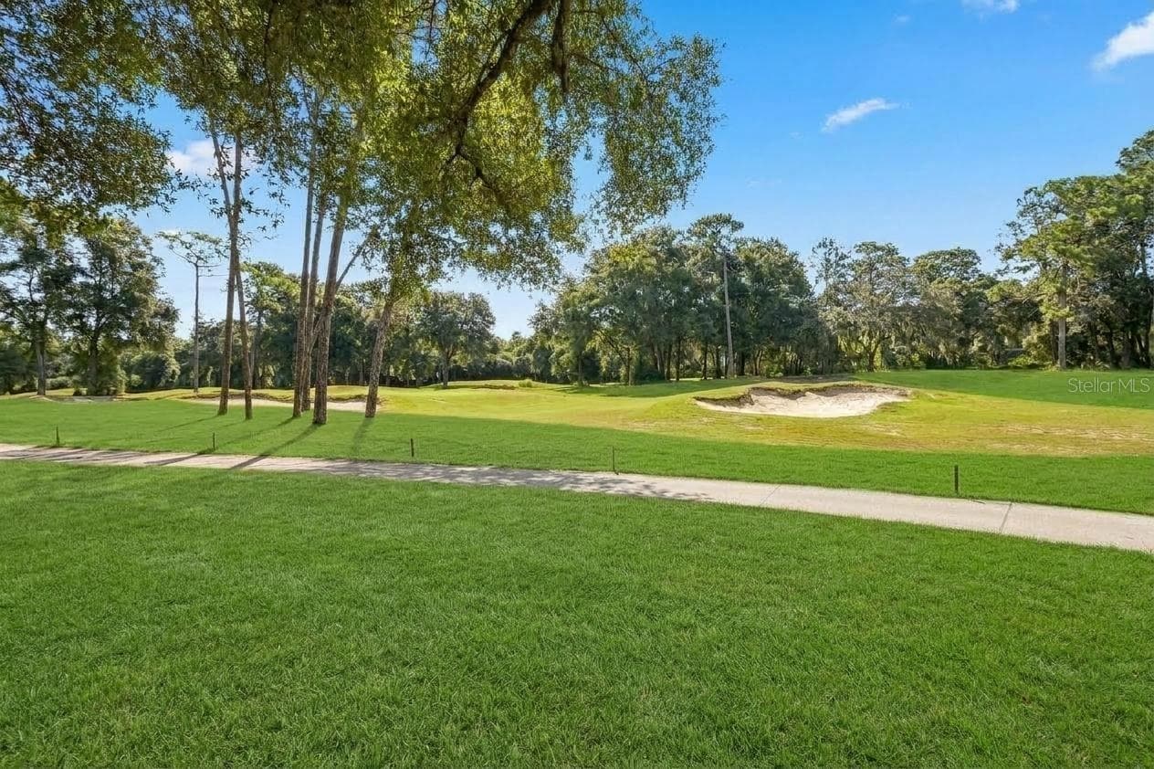 Home is located on the *th hole! - 502 VICTORIA HILLS DR, DELAND