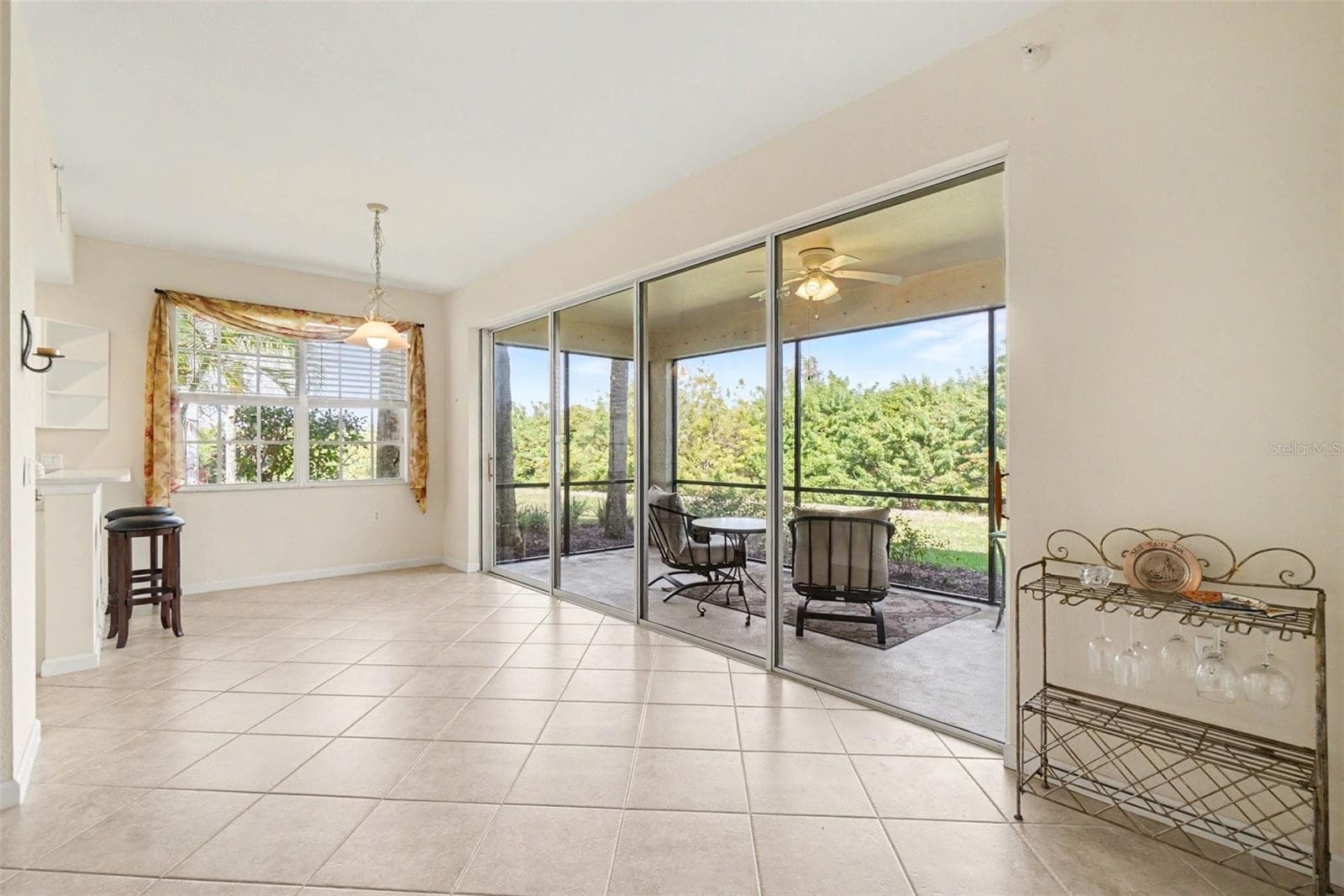 view from living of lanai and dining room - 4683 CLUB DR #101, PORT CHARLOTTE