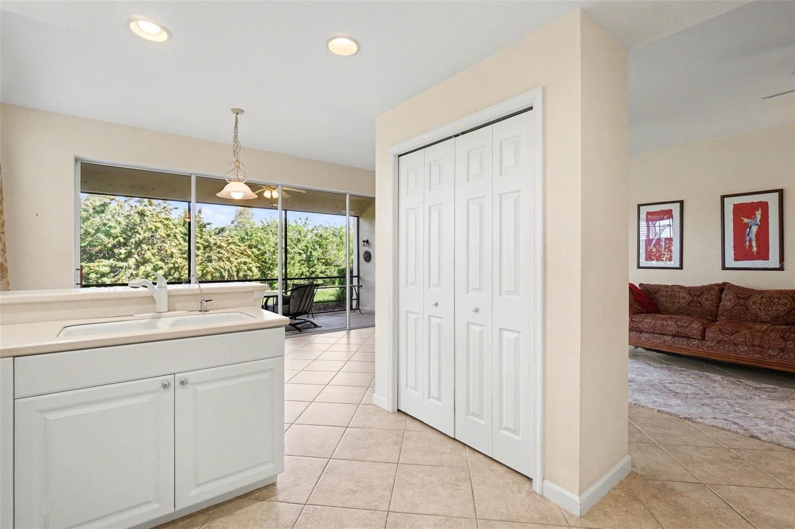 Closet pantry in kitchen provides extra storage! - 4683 CLUB DR #101, PORT CHARLOTTE