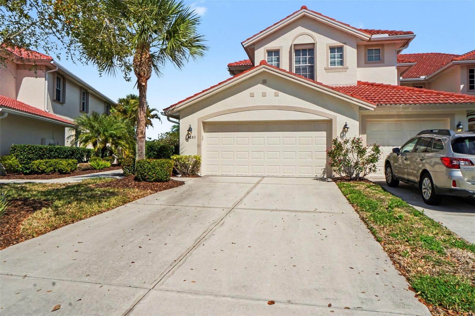 attached 2 car garage - 4683 CLUB DR #101, PORT CHARLOTTE