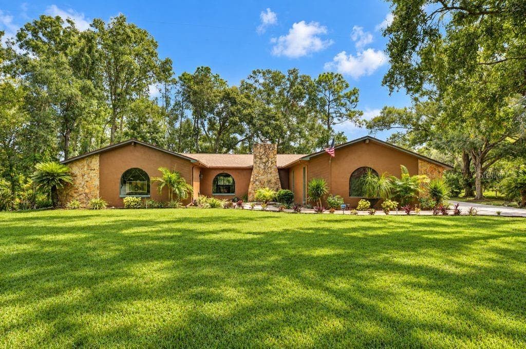 Single Family Residence at 6916 COPPERFIELD DR, NEW PORT RICHEY, photo 2 of 51