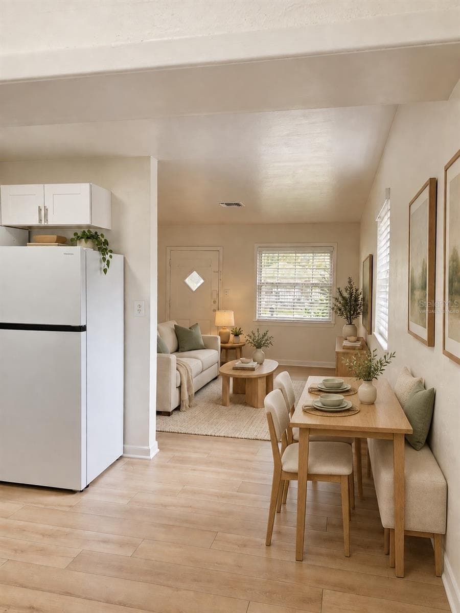 Virtually Staged Kitchen Eating Area and view of Living Room - 2103 N HAROLD AVE, TAMPA