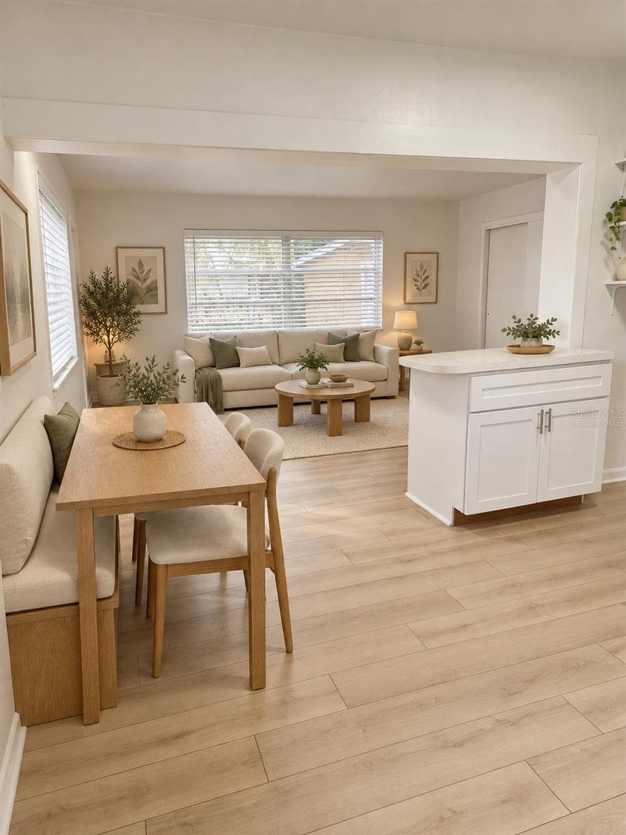 Virtually staged Family Room from Kitchen area - 2103 N HAROLD AVE, TAMPA