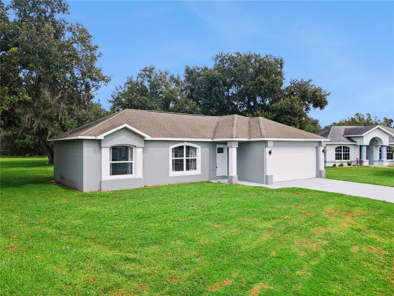 Front Side - 1011 EIFFEL LN, KISSIMMEE