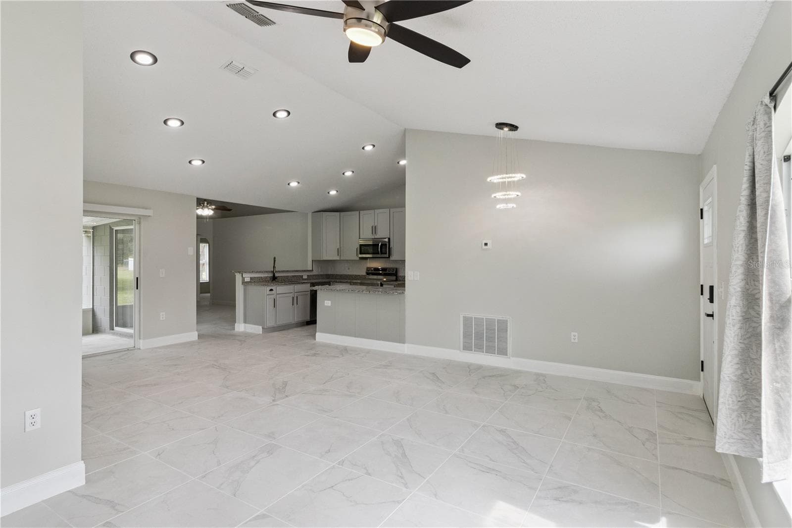 Front Entrance/Living Room/Kitchen - 1011 EIFFEL LN, KISSIMMEE