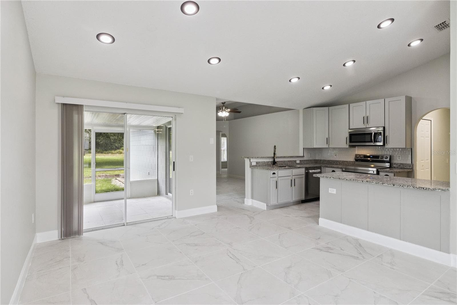 Living Room/Kitchen 2 - 1011 EIFFEL LN, KISSIMMEE