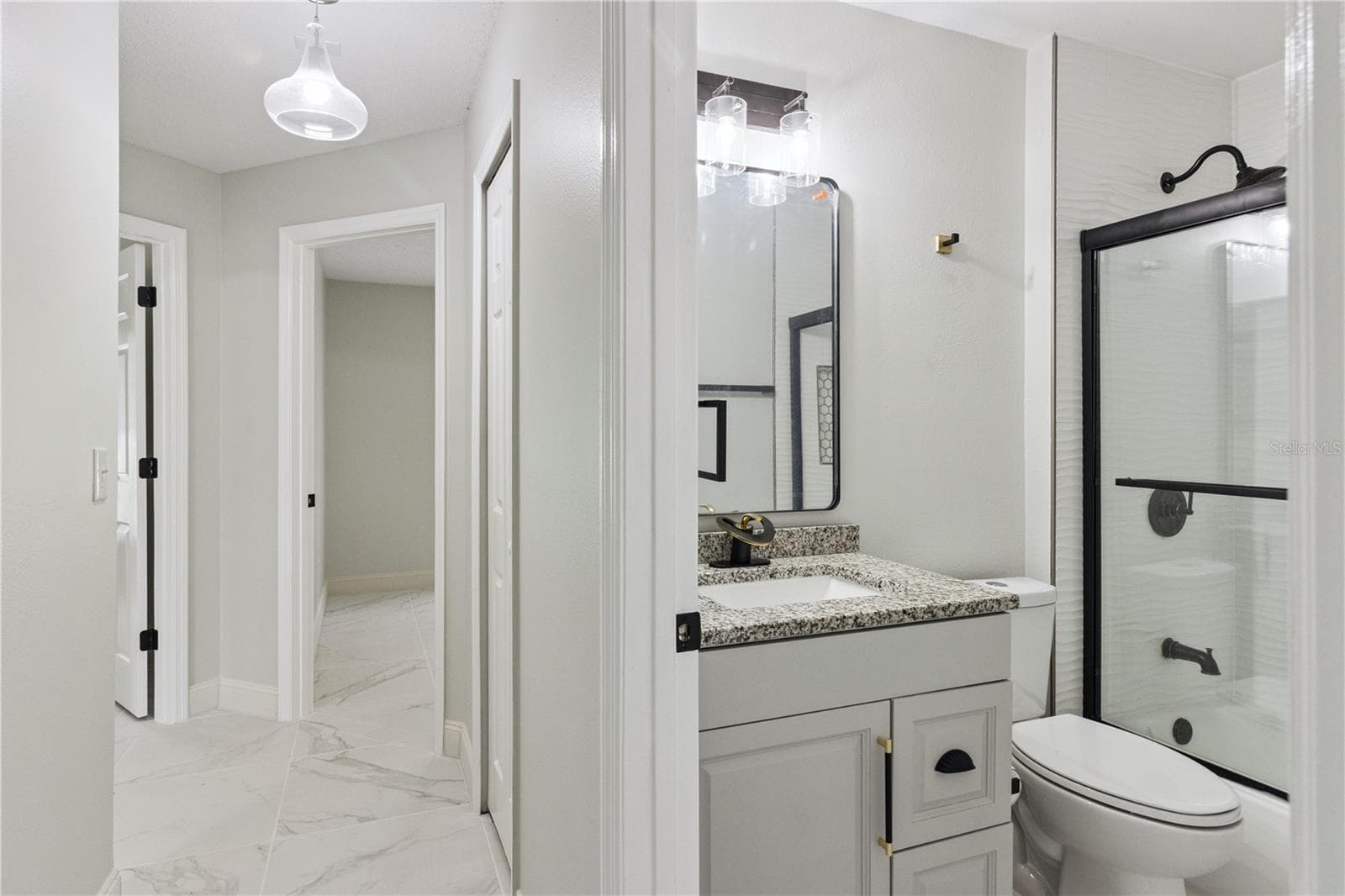 Hallway/ 2nd Bath - 1011 EIFFEL LN, KISSIMMEE
