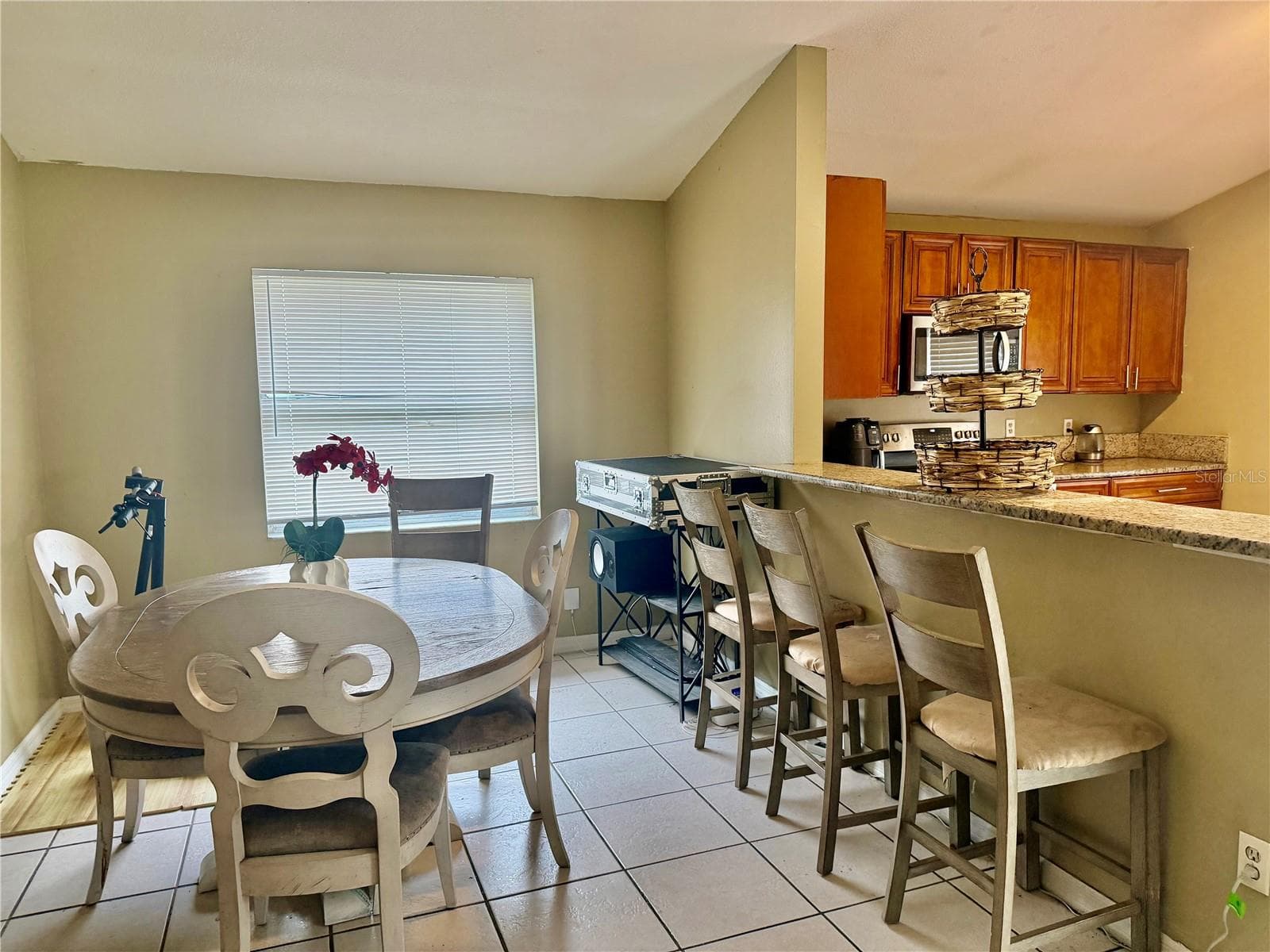 DINING ROOM and BREAKFAST BAR - 7912 ANTIBES CT, ORLANDO