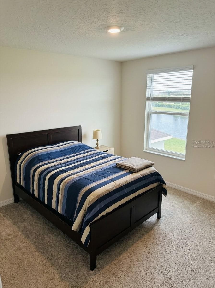 virtually staged fourth bedroom - 5058 GRANITE DUST PL, PALMETTO