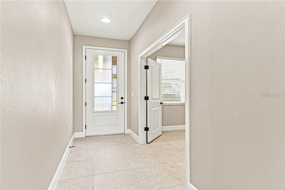 Entryway with Flex Room entrance - 2171 Fallon BLVD NE, PALMBAY FL 32907, Palm Bay