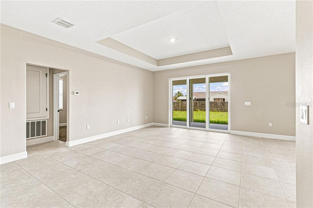 Great Room with Tray Ceilings - 2171 Fallon BLVD NE, PALMBAY FL 32907, Palm Bay