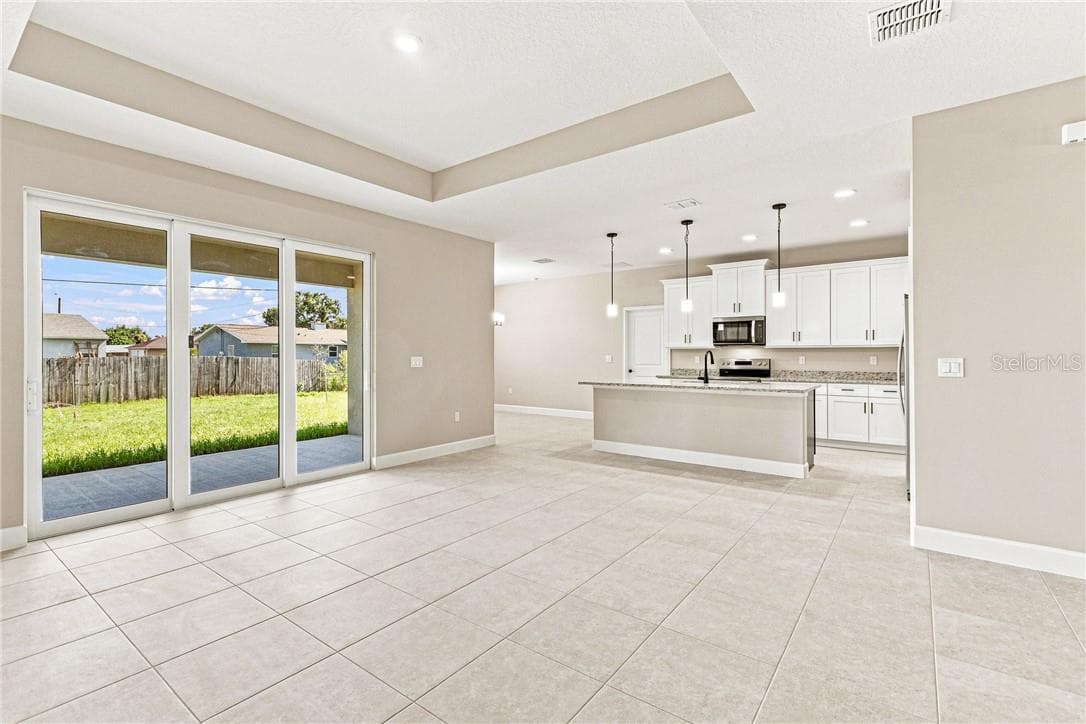 Great room with Kitchen and Patio - 2171 Fallon BLVD NE, PALMBAY FL 32907, Palm Bay