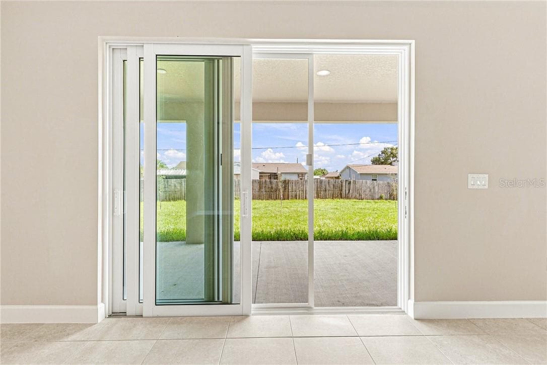 Patio door in great room - 2171 Fallon BLVD NE, PALMBAY FL 32907, Palm Bay