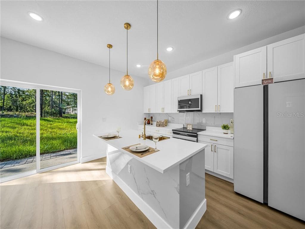 Kitchen Overlooking Dining and Living Areas - 6664 N Bedstrow BLVD, CITRUSSPRINGS FL 34434, Citrus Springs