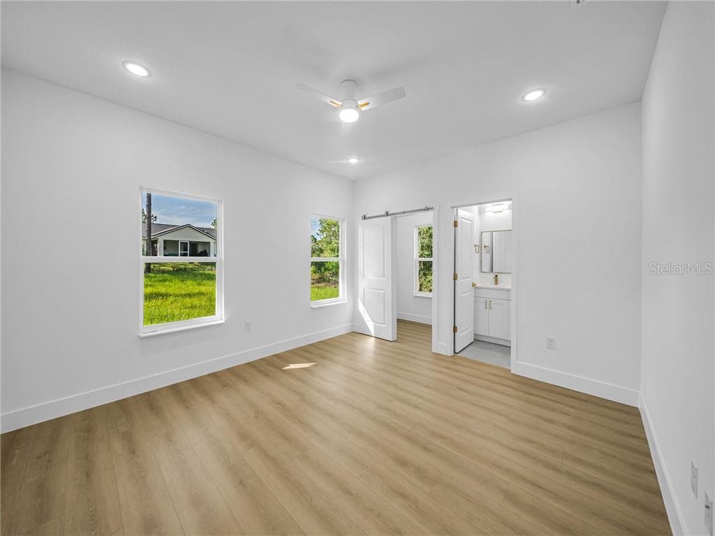 Spacious Primary Bedroom with Natural Light - 6664 N Bedstrow BLVD, CITRUSSPRINGS FL 34434, Citrus Springs