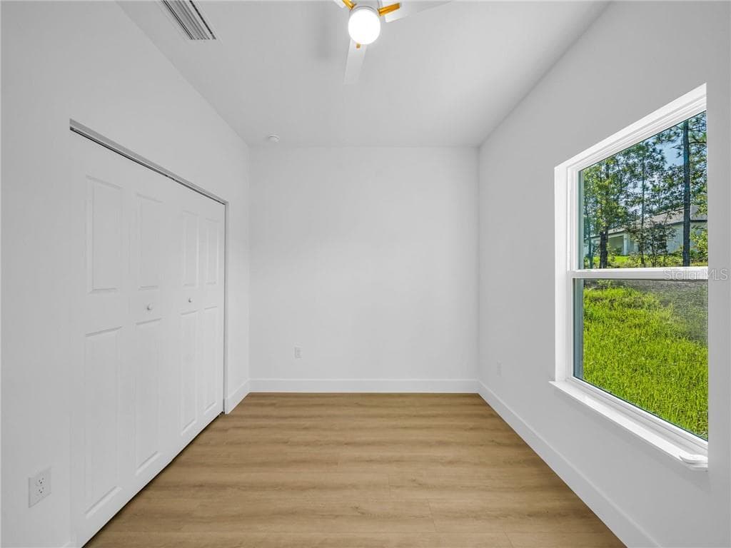 Bedroom 3 with Natural Light and Closet Space - 6664 N Bedstrow BLVD, CITRUSSPRINGS FL 34434, Citrus Springs