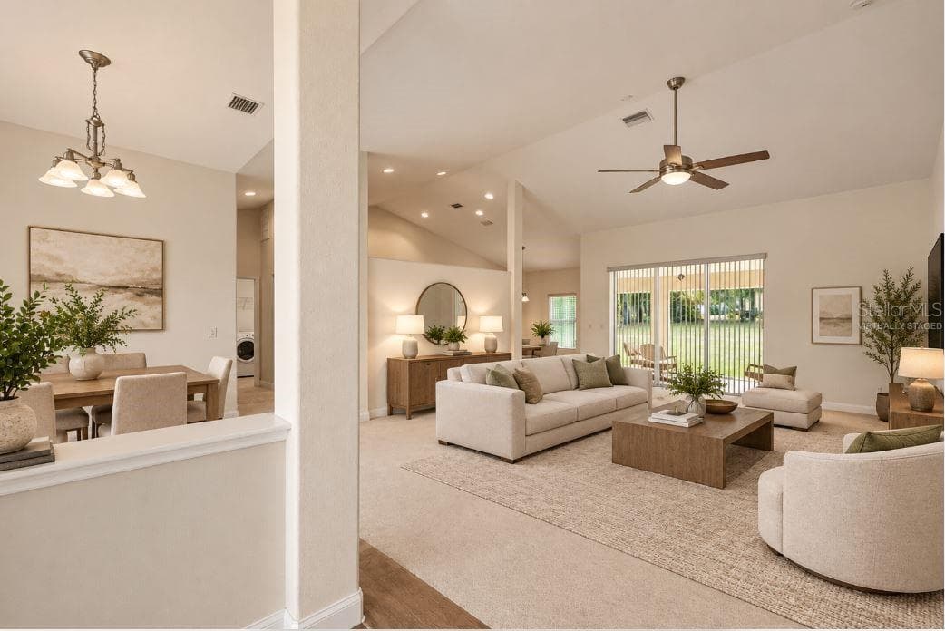 virtually staged living room. - 2820 E NEWHAVEN ST, INVERNESS