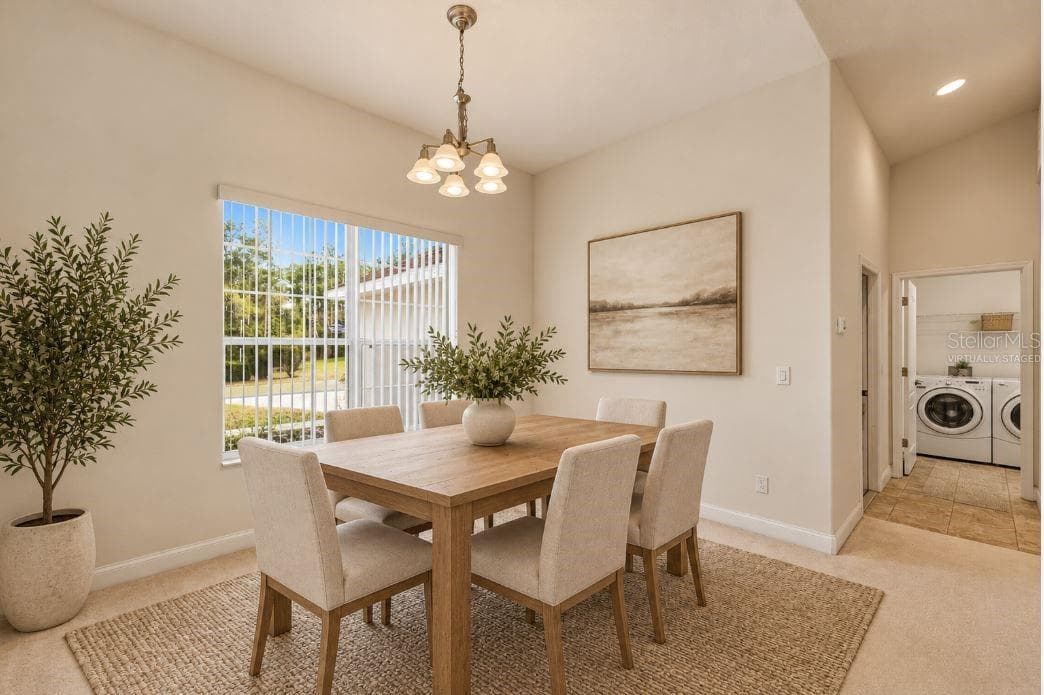 Virtually staged dining room. - 2820 E NEWHAVEN ST, INVERNESS