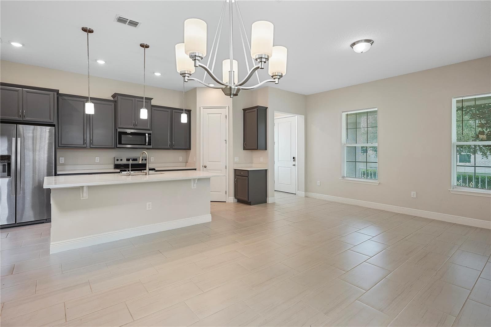 Livingroom and dinning - 9936 PALLIDA HICKORY WAY, WINTER GARDEN