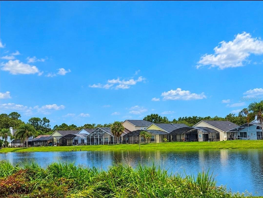 WATER VIEW FROM POOL - 4640 EAGLE PEAK DR, KISSIMMEE