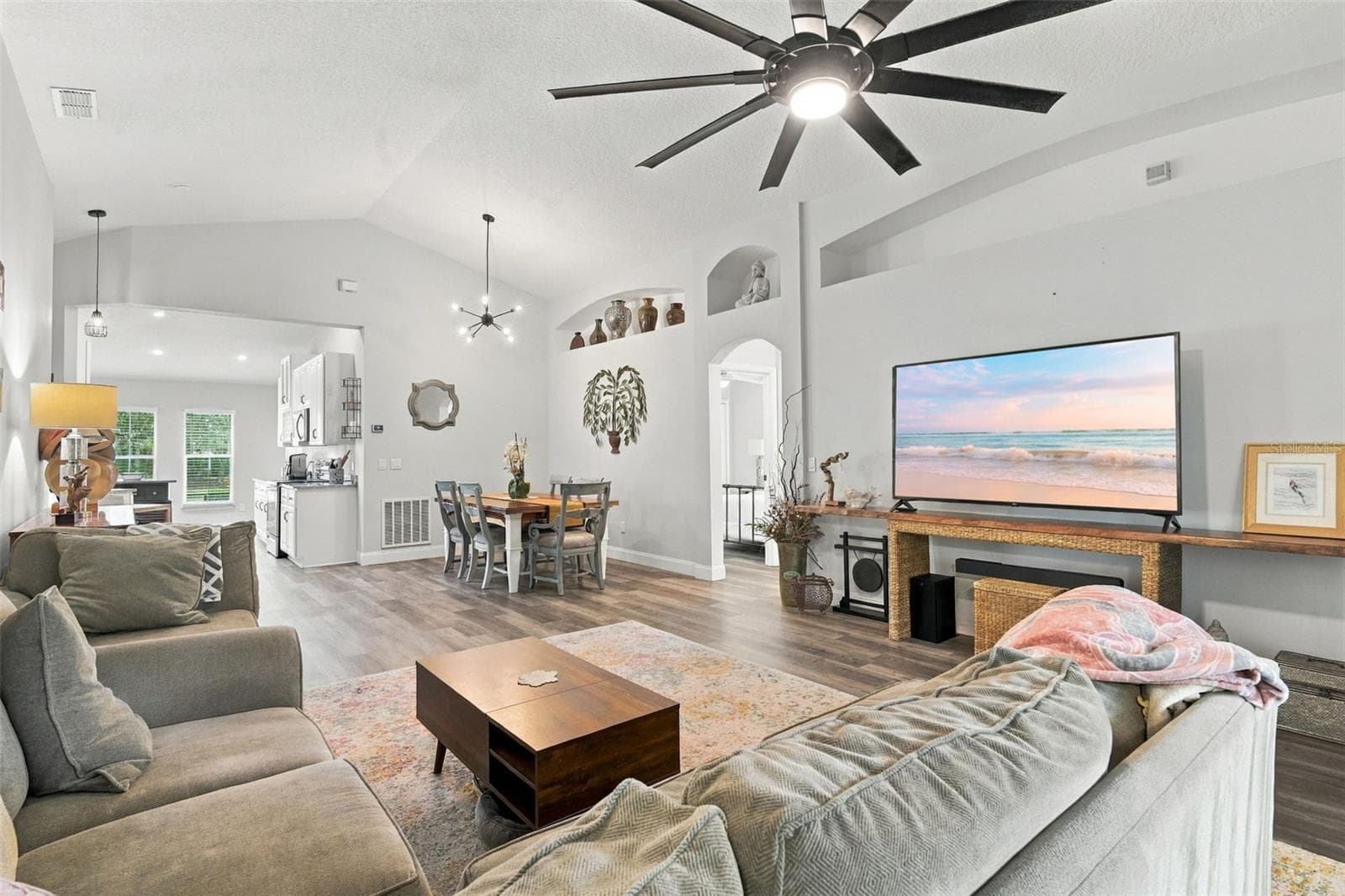 Main living area towards dining area. - 430 DEANNA CIR, DELAND