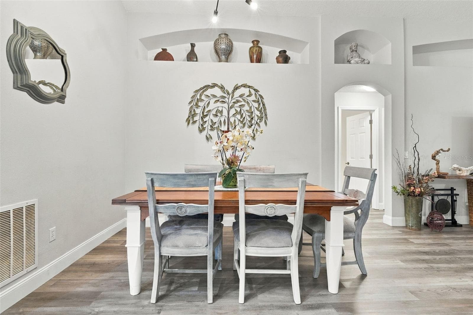 The dining area is adjacent to the main living area. - 430 DEANNA CIR, DELAND
