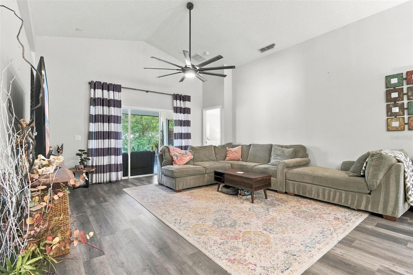 Main living area from entrance to bedrooms #2 and #3. - 430 DEANNA CIR, DELAND