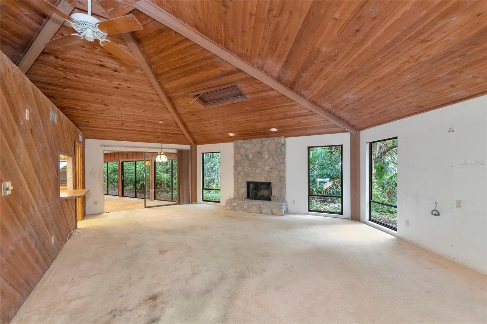 High ceiling in the combined Living/Dining Room - 4781 STONE RIDGE TRL, SARASOTA