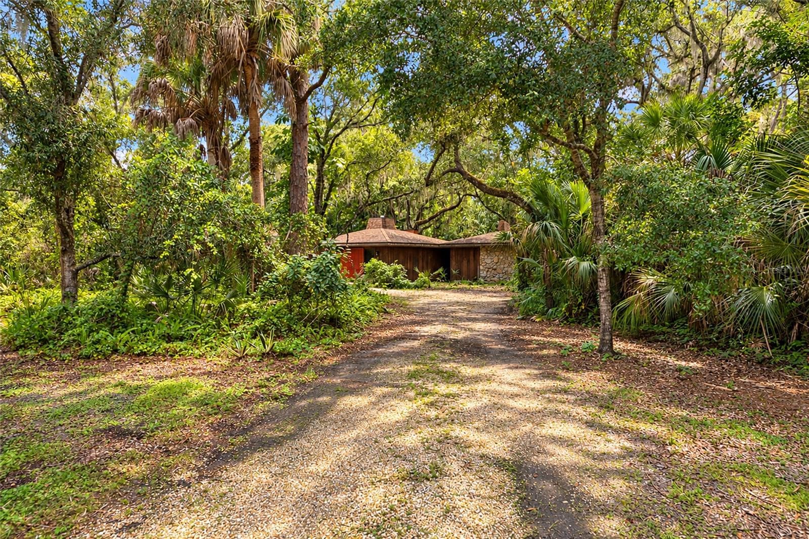 1 Acre Wooded Setting. Opportunity to update the existing home or build new in Hidden Oaks Estates. - 4781 STONE RIDGE TRL, SARASOTA