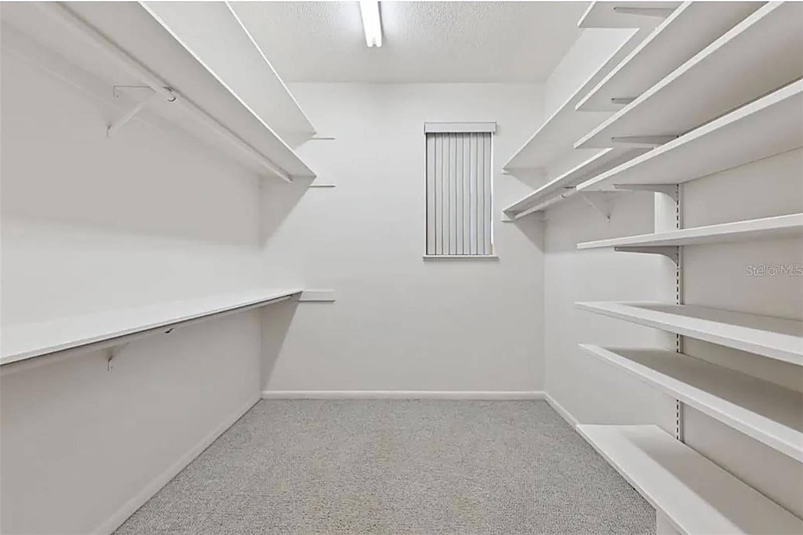 Walk in closet in upstairs 2nd primary suite - 221 PINE CONE LN, LONGWOOD