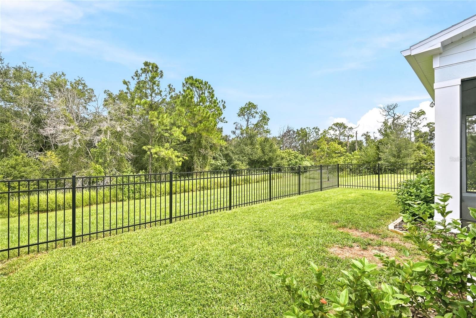 Newly fenced backyard - 14437 MAIDEN TER, LAKEWOOD RANCH