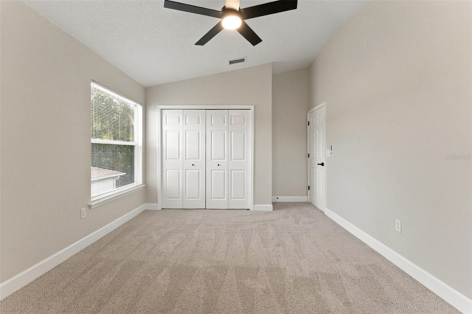 Bedroom 3 with wall closet, new fan & carpet - 10102 VISTA POINTE DR, TAMPA