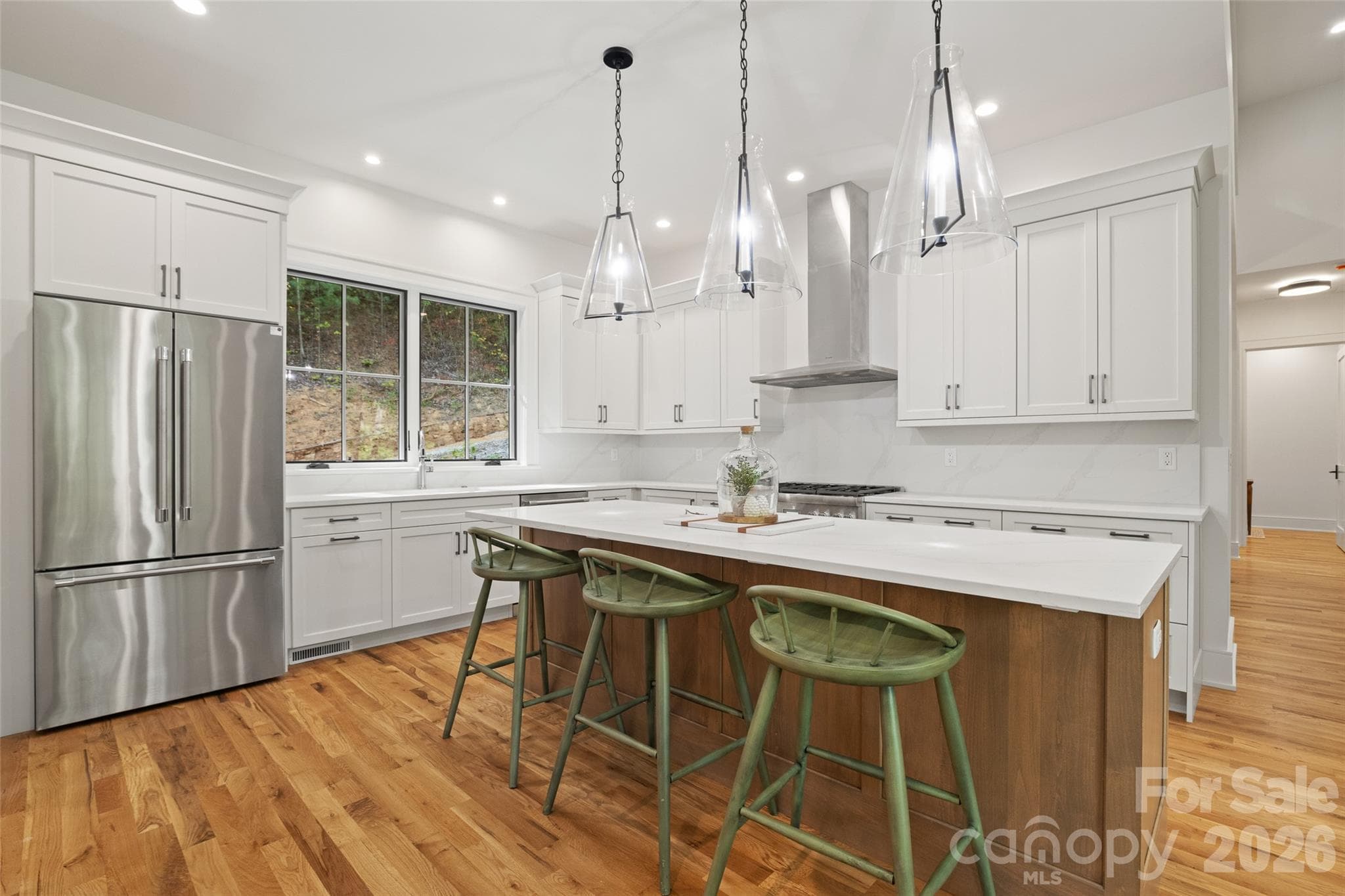 Bright kitchen with an abundance of custom cabinetry - 505 Barrington Drive, Asheville