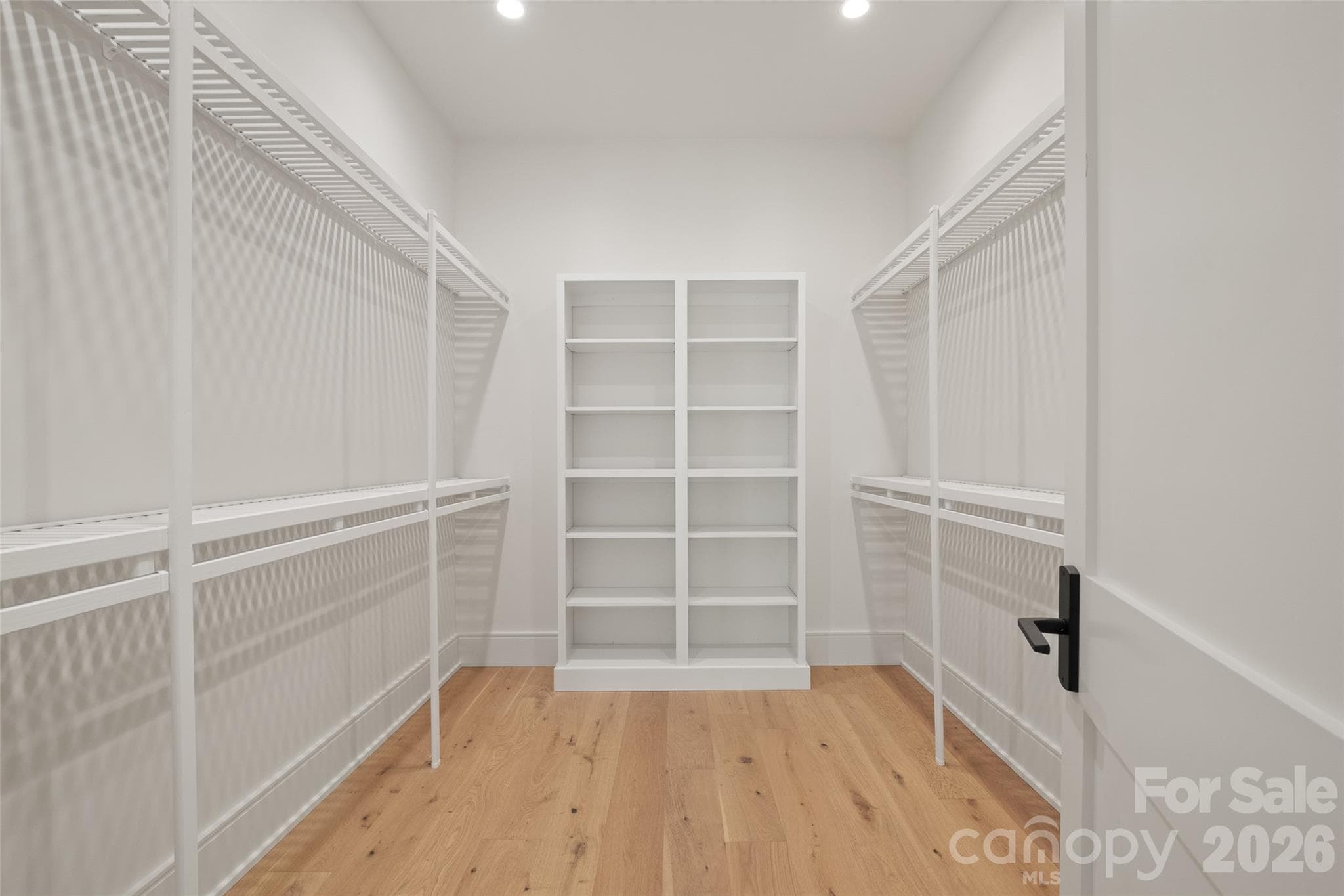 Walk in closet with built in shelving - 505 Barrington Drive, Asheville