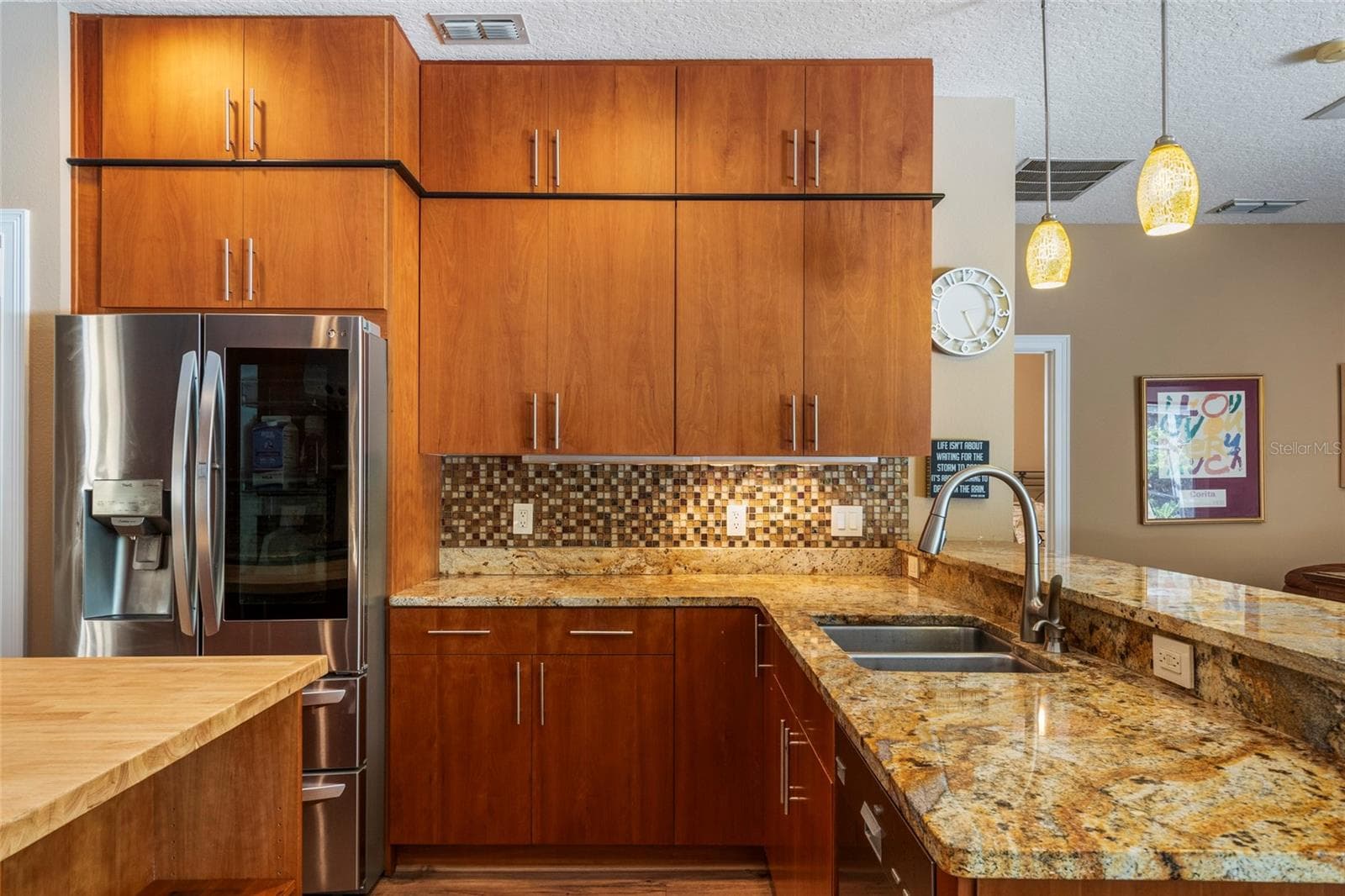 Gourmet Master Chef inspired kitchen - Stone Counters, Custom Cabinetry from ceiling to floor - 2712 ALOMA OAKS DR, OVIEDO