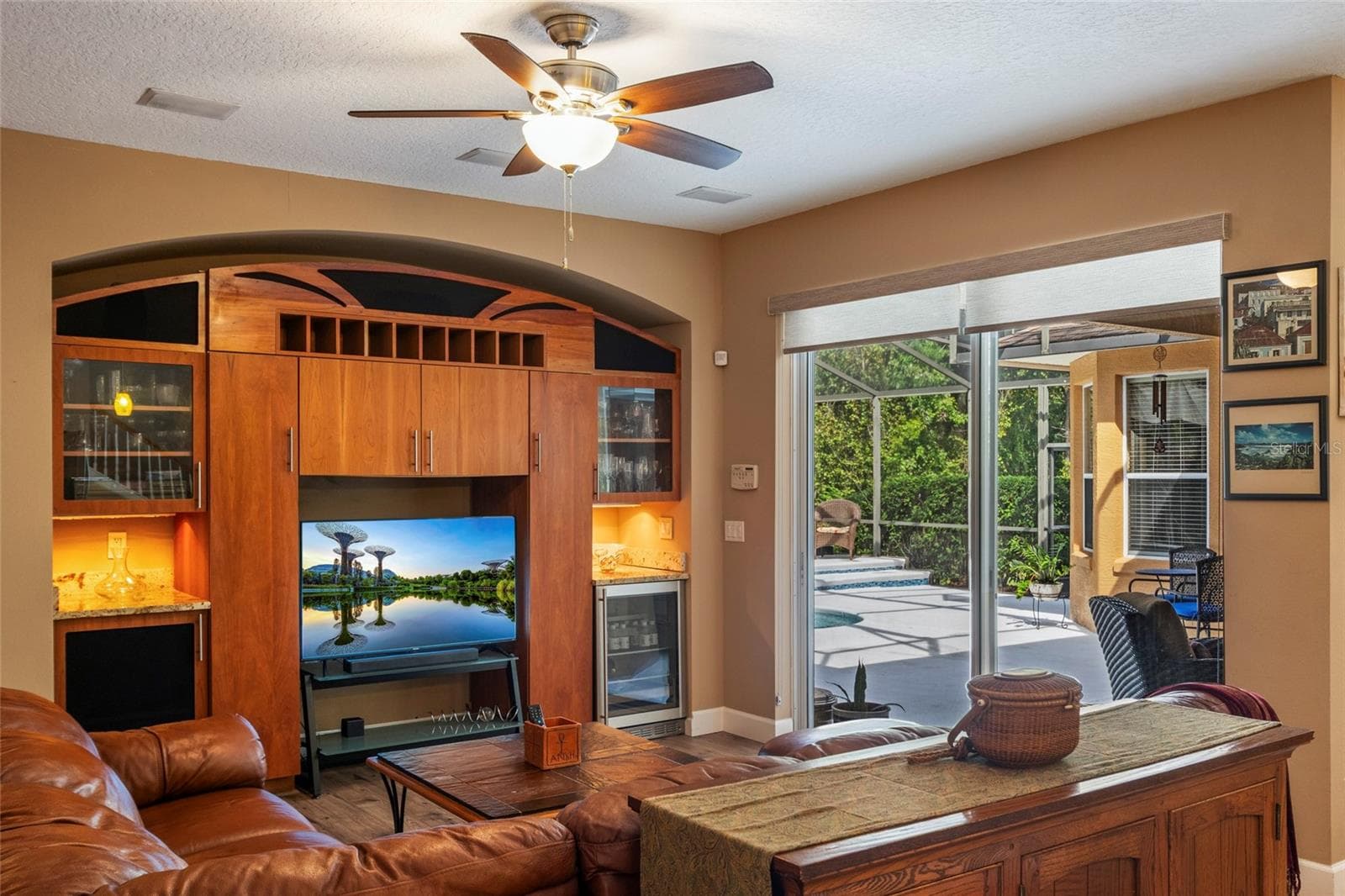 Access to Lanai from Family Room, Living Room and Primary Suite - 2712 ALOMA OAKS DR, OVIEDO