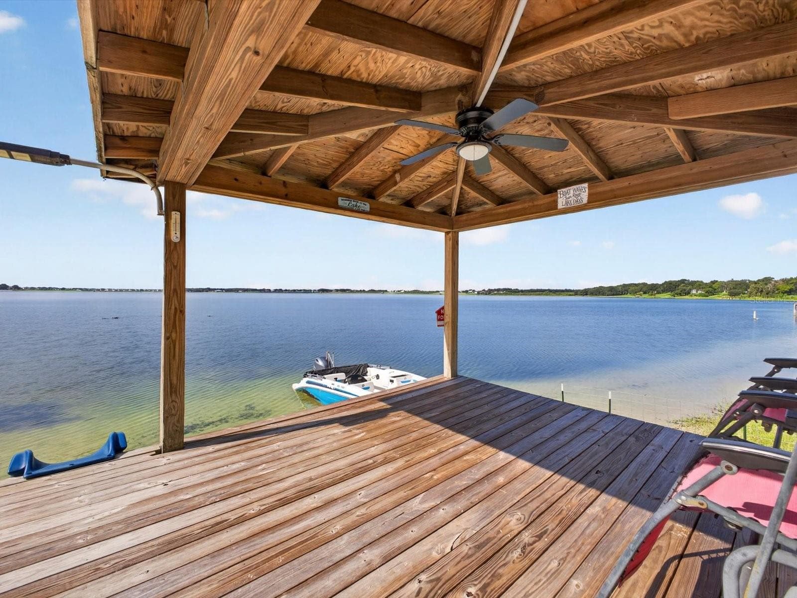 underneath covered boat dock - 1380 EAGLE AVE E, EAGLE LAKE