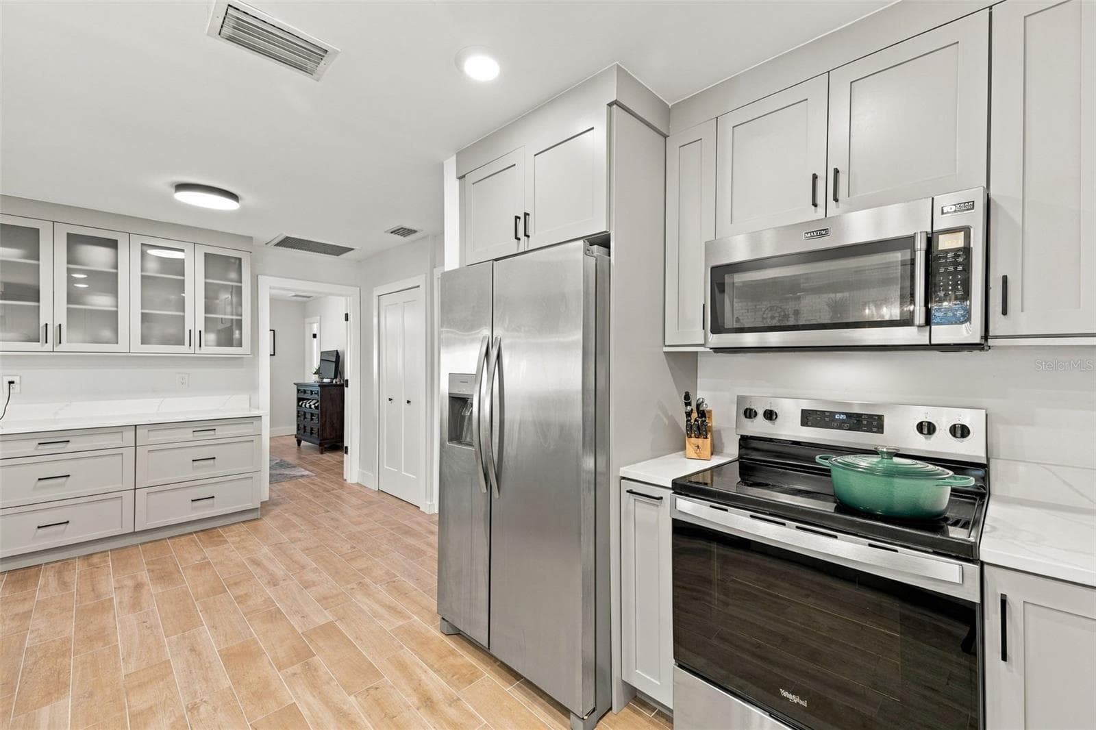 Kitchen with View of Pantry - 4318 HELENA ST NE, ST PETERSBURG