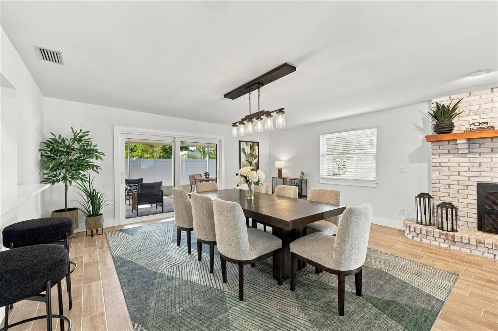 Dining Room / Family Room with Fireplace - 4318 HELENA ST NE, ST PETERSBURG