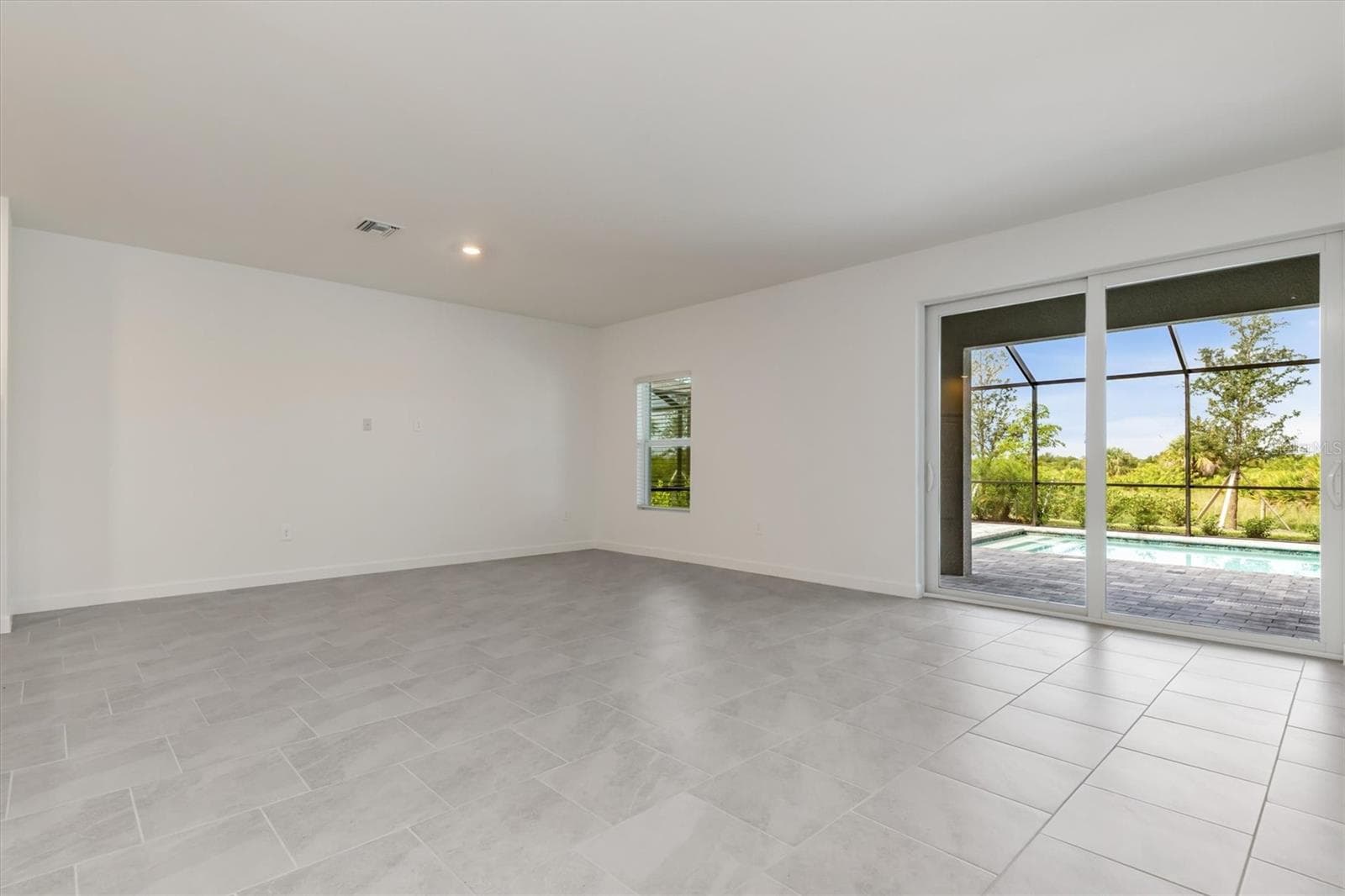Living Area - 13320 GRASSMERE CT, PUNTA GORDA