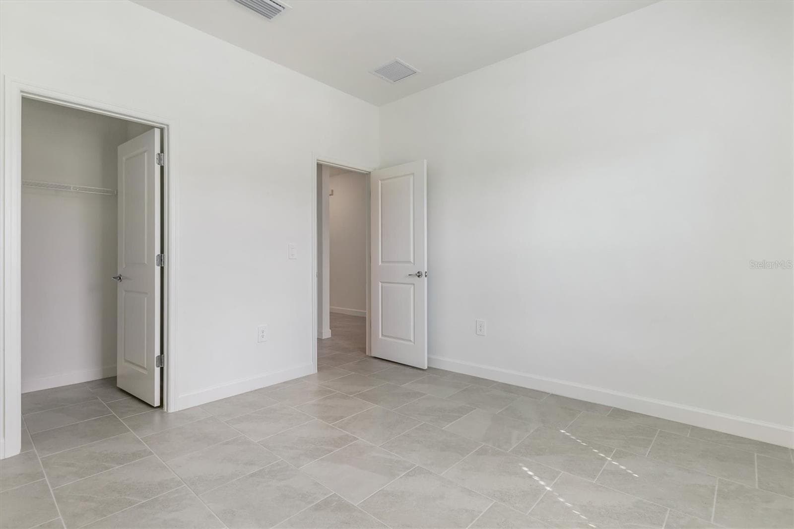 Second Bedroom in Front of House - 13320 GRASSMERE CT, PUNTA GORDA