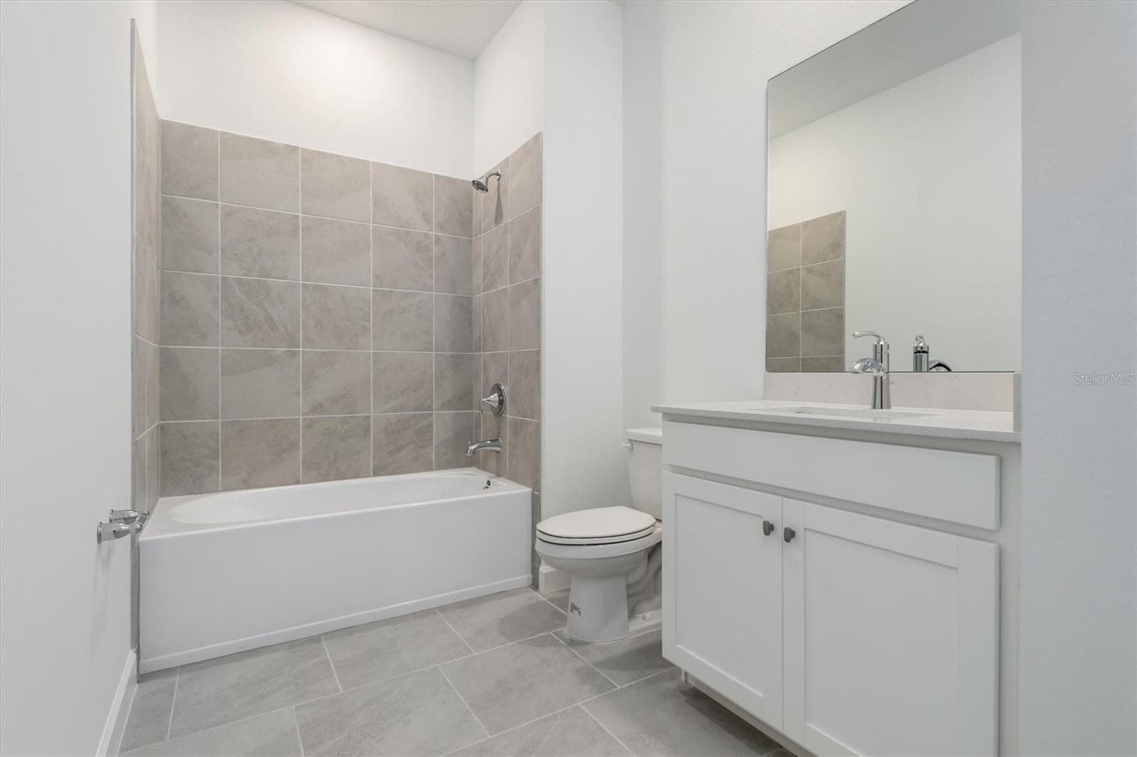 Front Guest Room Bath - 13320 GRASSMERE CT, PUNTA GORDA