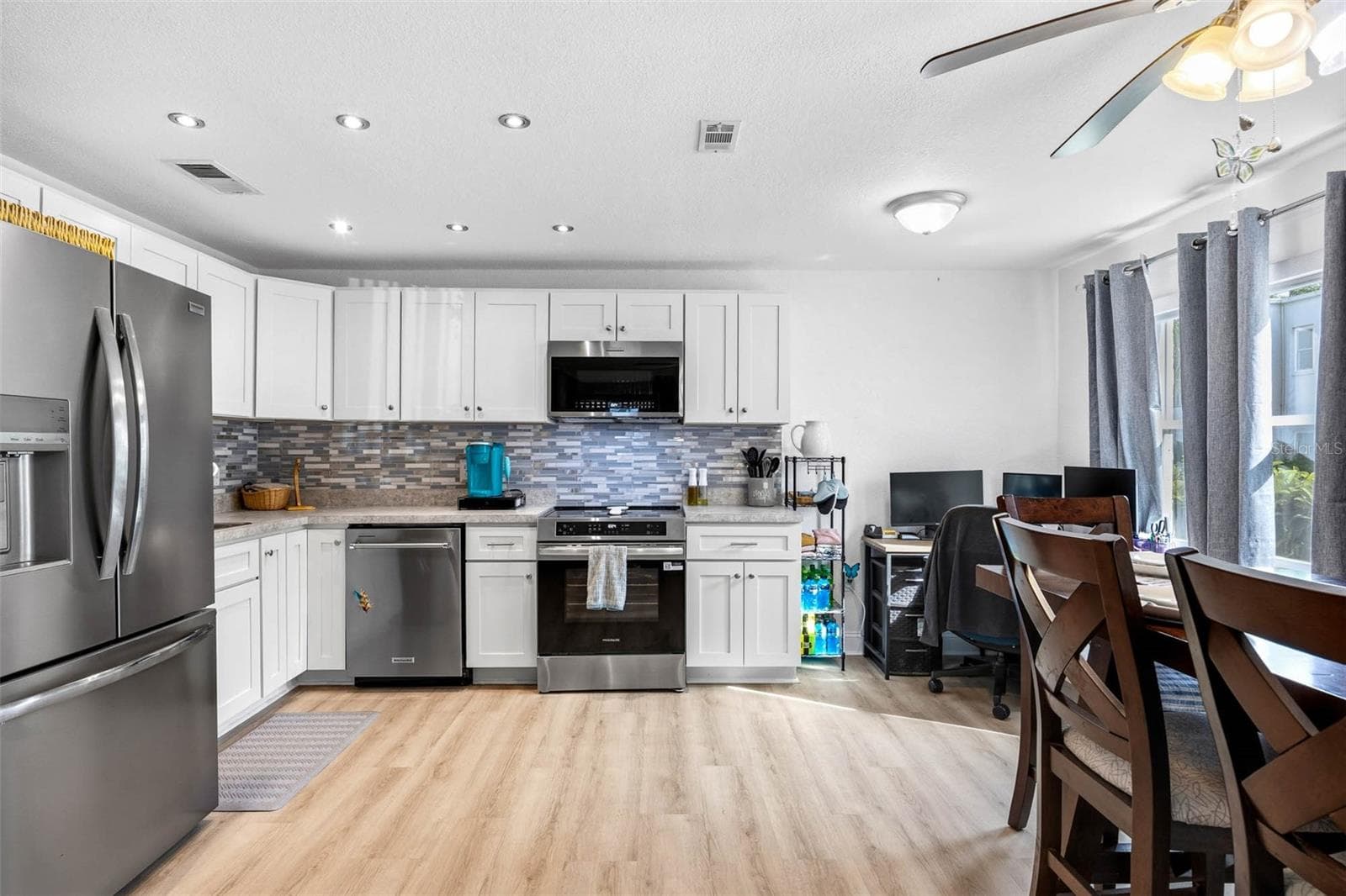 Updated Kitchen with Shaker Cabinets - 345 S MCMULLEN BOOTH RD #143, CLEARWATER