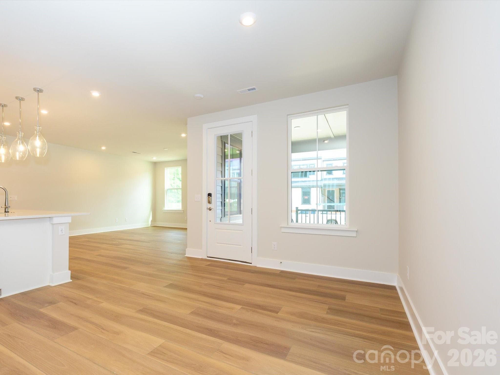 Front Entry Leading to Thoughtfully Placed Dining Area. - 217 Halemarg Drive, Belmont