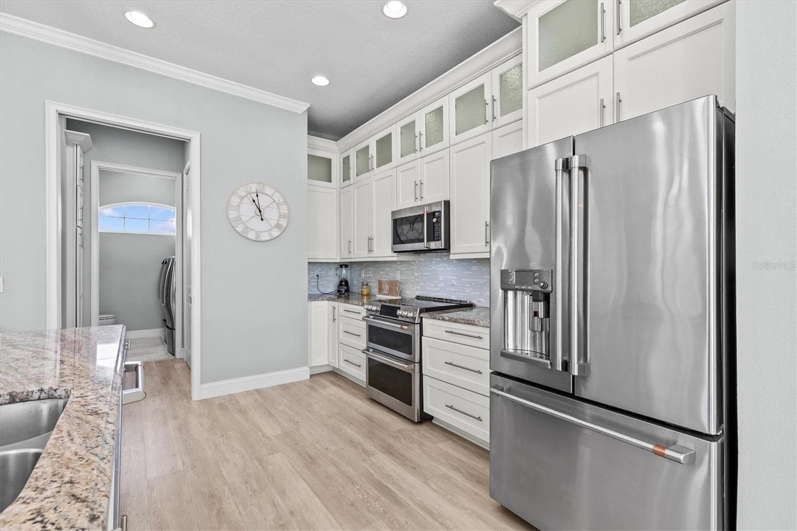 Kitchen to Pantry/Built in Desk/powder Room - 4030 GULF COAST DR, HERNANDO BEACH