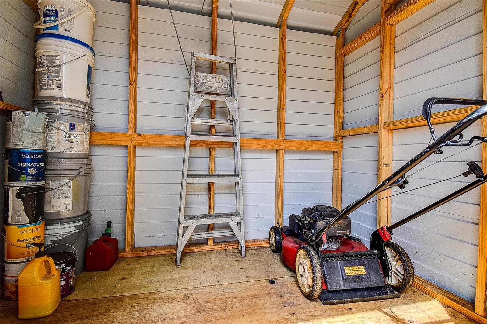 New Storage Shed with Lawn Mower. - 6237 DALTON ST, SPRING HILL