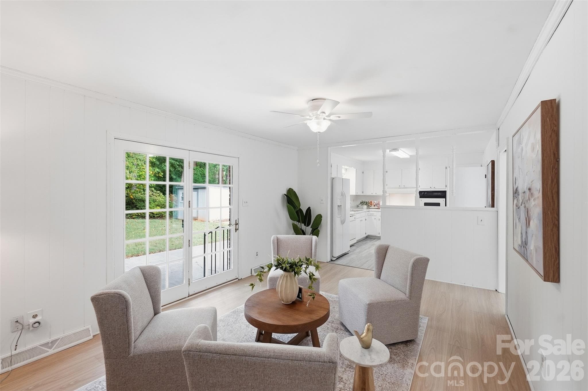 Family Room seamlessly flows into the Kitchen - 5724 Telfair Road, Charlotte