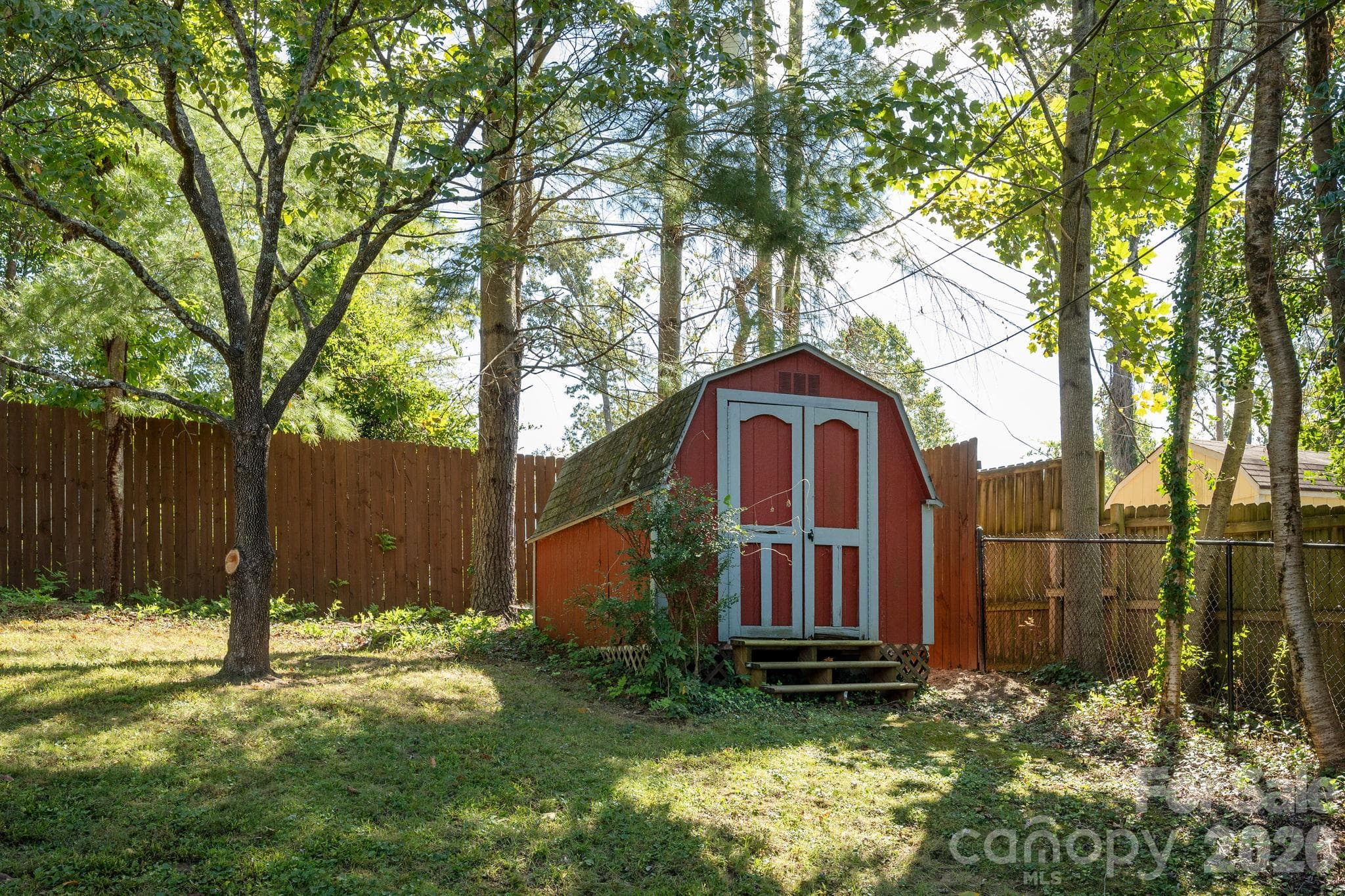 Convenient shed in back of yard for storing equipment - 224 Lyndale Road, Hendersonville