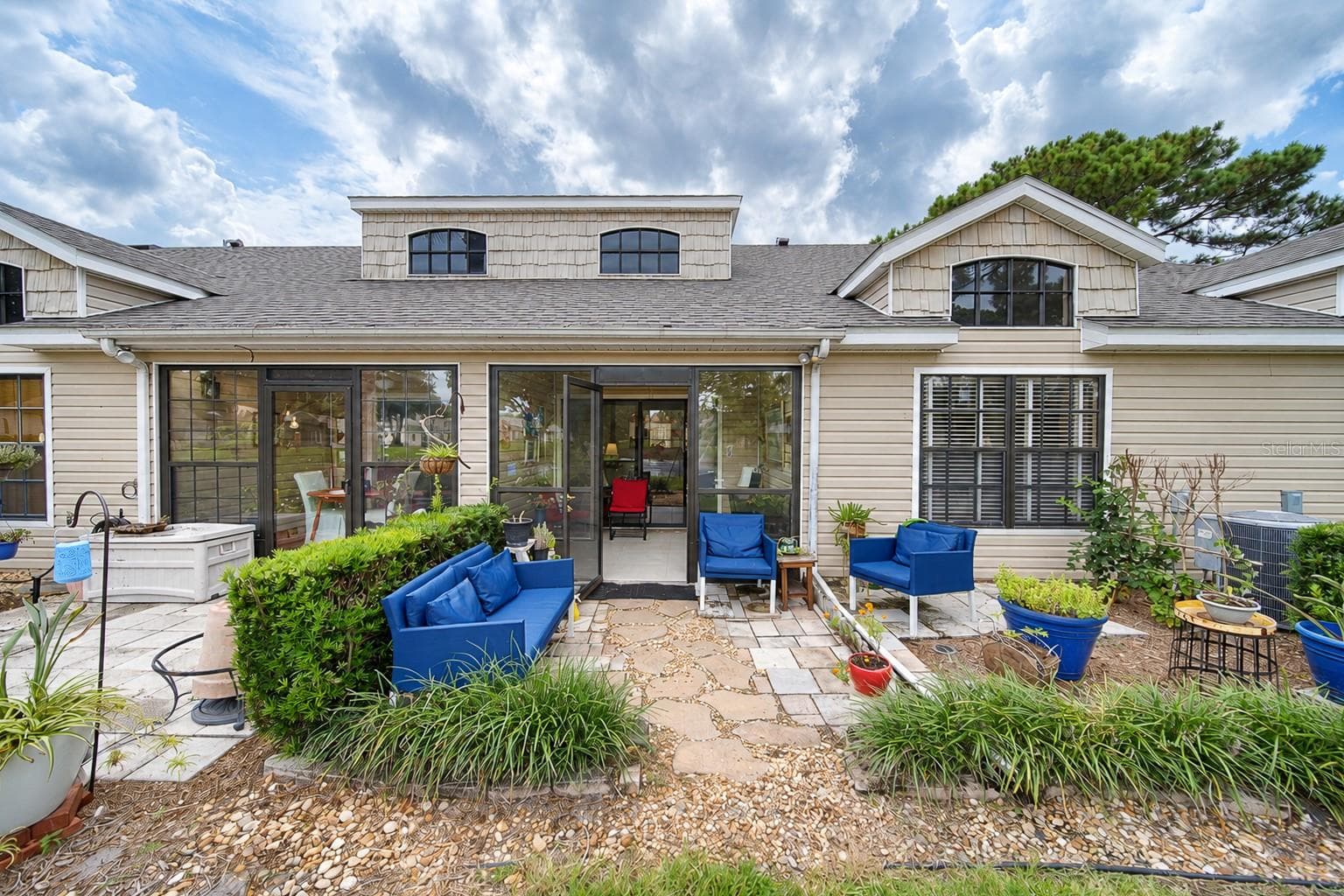 rear-patio - 136 JUNIPER WAY, TAVARES